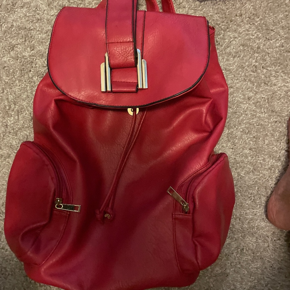 100% leather Backpack